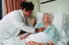 Image of nurse caring for elderly patient